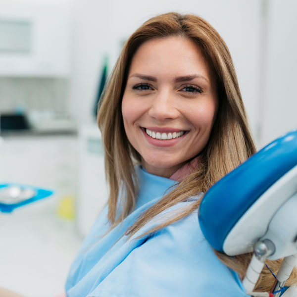 woman smiling in dental chair